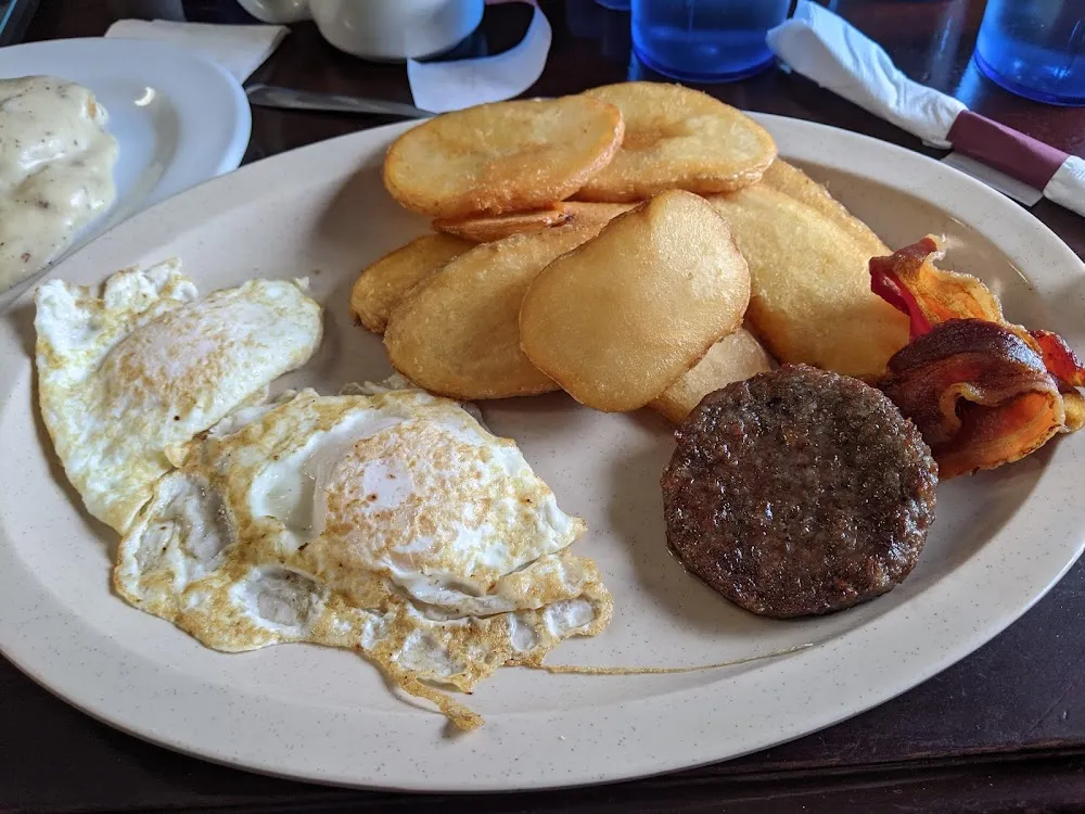 Eggs Fried Potatoes and Sausage Bacon
